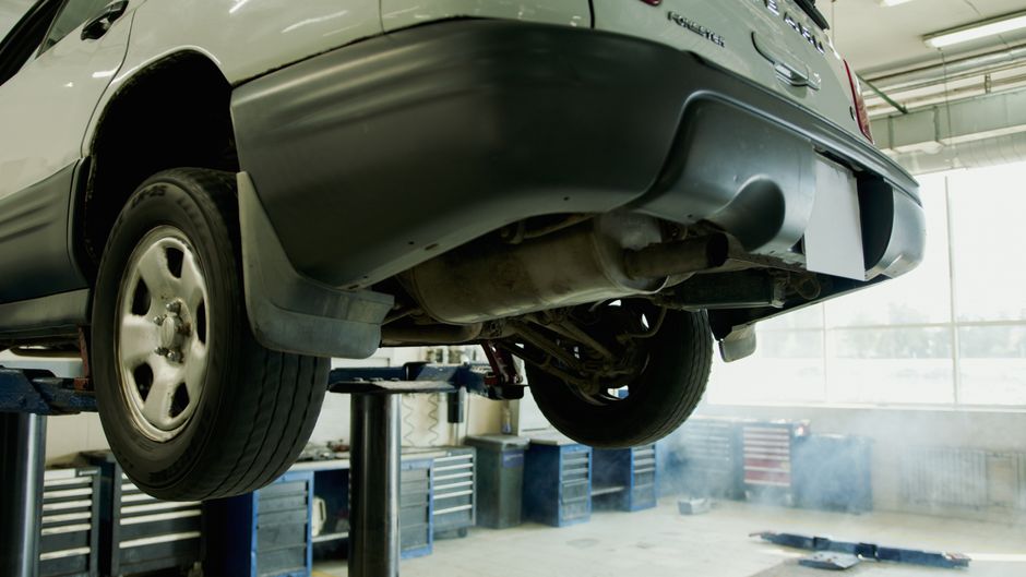 Vehicle positioned on an alignment lift